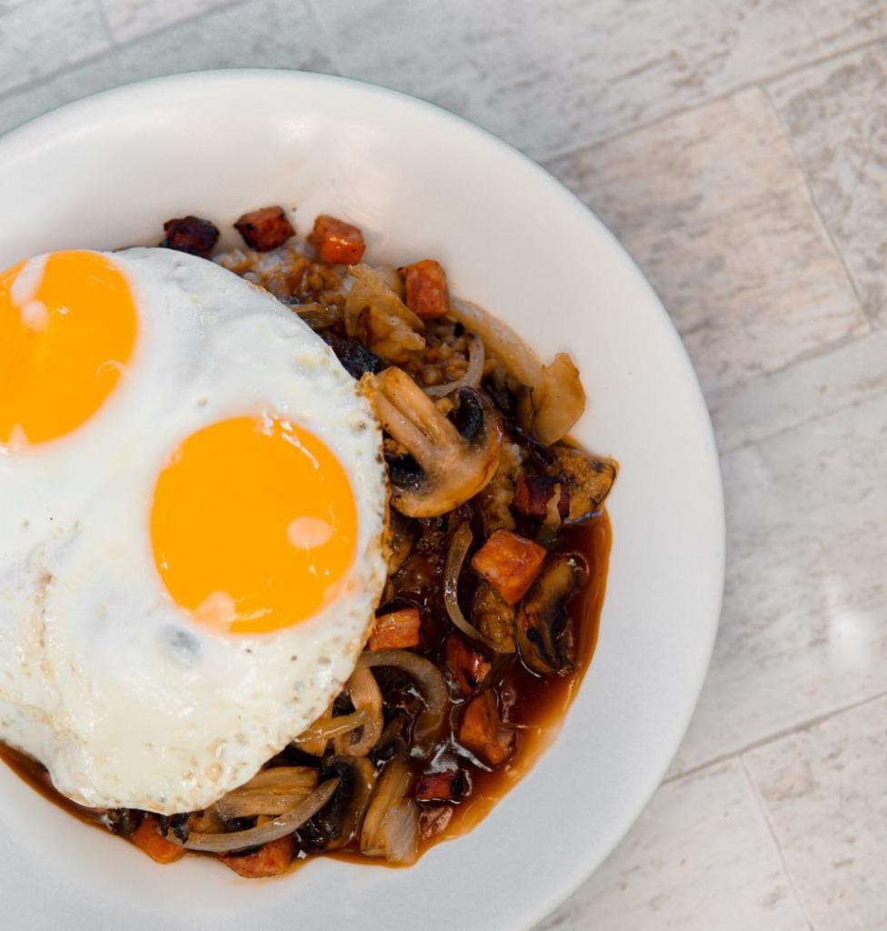 Hawaiian Style Loco Moco · Local beef patty on a bed of rice covered with brown gravy, mushrooms, onions and diced Portuguese sausage topped off with 2 eggs cooked any style. 