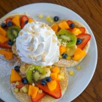 Fresh Fruit Rainbow Pancakes · Three Macadamia Nut Pancakes Topped with Banana, Pineapple, Fresh Strawberries, Kiwi, Papaya...