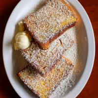 Hawaiian Sweet Bread French Toast · 3 pieces of sweet bread French toast with powdered sugar