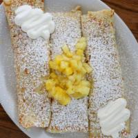 Sour Cream & Fresh Pineapple Crepes · Our 3 piece thin delicate crepes filled with sour cream and fresh pineapples. 