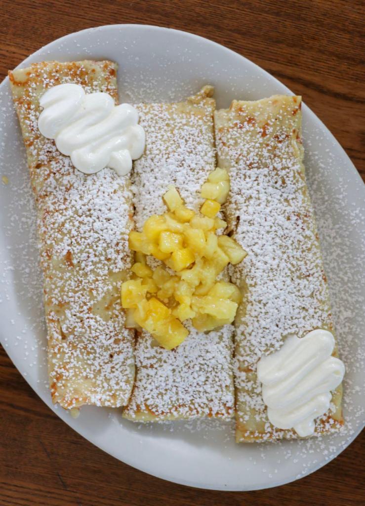 Sour Cream & Fresh Pineapple Crepes · Our 3 piece thin delicate crepes filled with sour cream and fresh pineapples. 