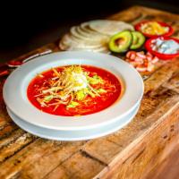 Chicken Tortilla Soup · Tender shredded chicken in a rich tomato broth. Topped with corn tortilla strips, sour cream...