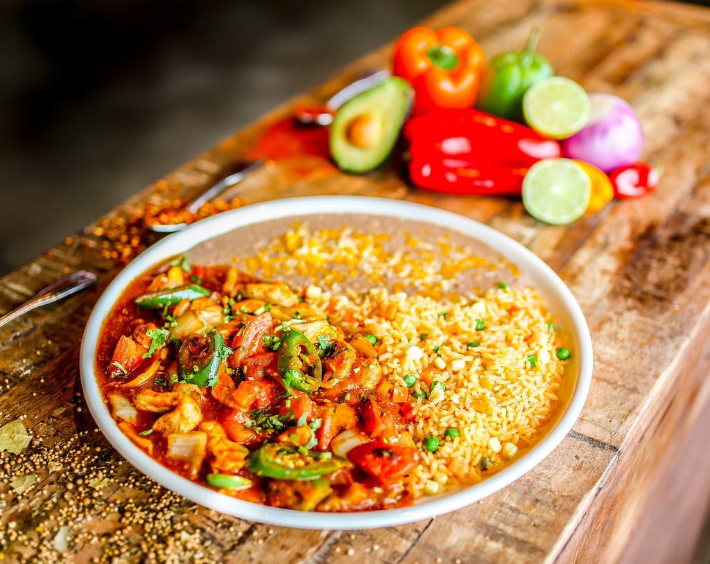Pollo a la Mexicana · Tender chunks of chicken, sauteed in our azteca sauce, chopped tomatoes, bell peppers, onions and cilantro. Served with Mexican rice and refried beans. Gluten free.