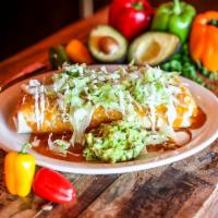 Pueblo Burritos · Large flour tortilla filled with Mexican rice, refried beans, mixed shredded cheese and roll...