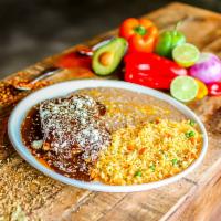 Enchiladas Chicken Mole · Mexico’s favorite blend of flavors combining an assortment of seeds, peanuts, chilies and ch...