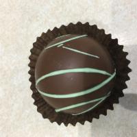 Mint Truffle · decadent milk and dark chocolate center with peppermint flavor and milk chocolate