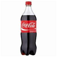 Coca Cola 20 oz. Bottle · Coke Original formula 20 FL oz.