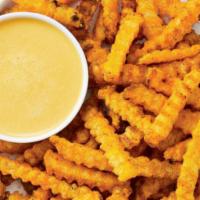 Small Cheesy Fries · French fries with cheese sauce on the side