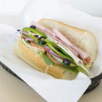 Jackie's Club Sandwich · Turkey, ham and roast beef. Choice of vegetables and dressing.