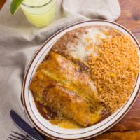 Sagebrush Enchilada · Two corn tortillas stuffed with melted Jack cheese and topped with enchilada sauce and more ...