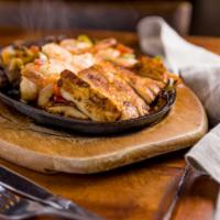 Supreme Fajita Plate · Combination of chicken, steak and either shrimp. 
