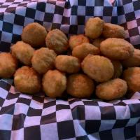 Corn Nuggets · Sweet Grade A corn pieces rolled into a ball then coated in crispy batter