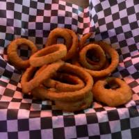 Onion Rings · Fried battered onion. Thin-cut battered onion rings are made with sweet yellow onions smothe...