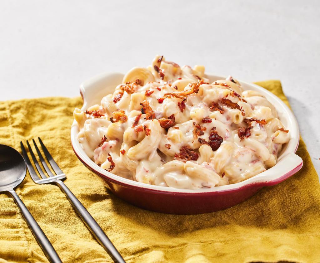 Garlicky Bacon Mac by Homeroom ·  By Homeroom. Creamy gouda, salty Italian pecorino cheese and just the right amount of garlic and bacon. Contains gluten and dairy. We cannot make substitutions.