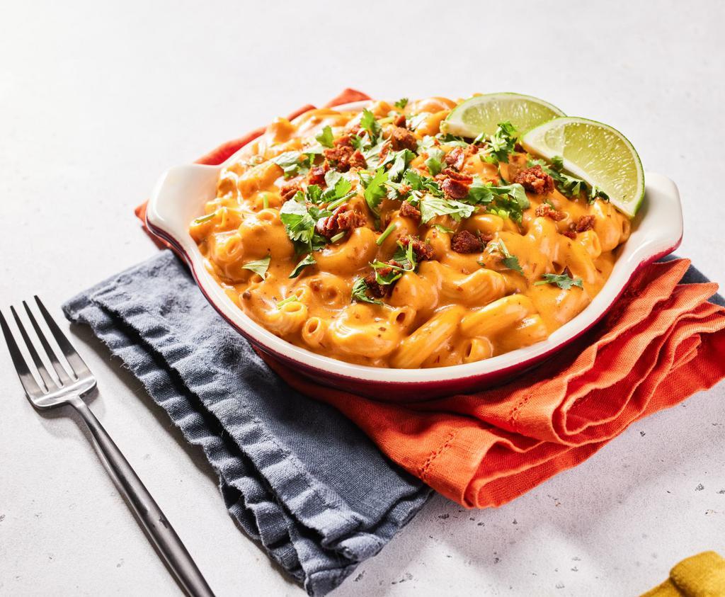 Mexican Chorizo Mac by Homeroom  · By Homeroom. Niman Ranch chorizo, jack cheese, homemade chipotle adobo, topped with lime. Contains gluten and dairy. We cannot make substitutions.