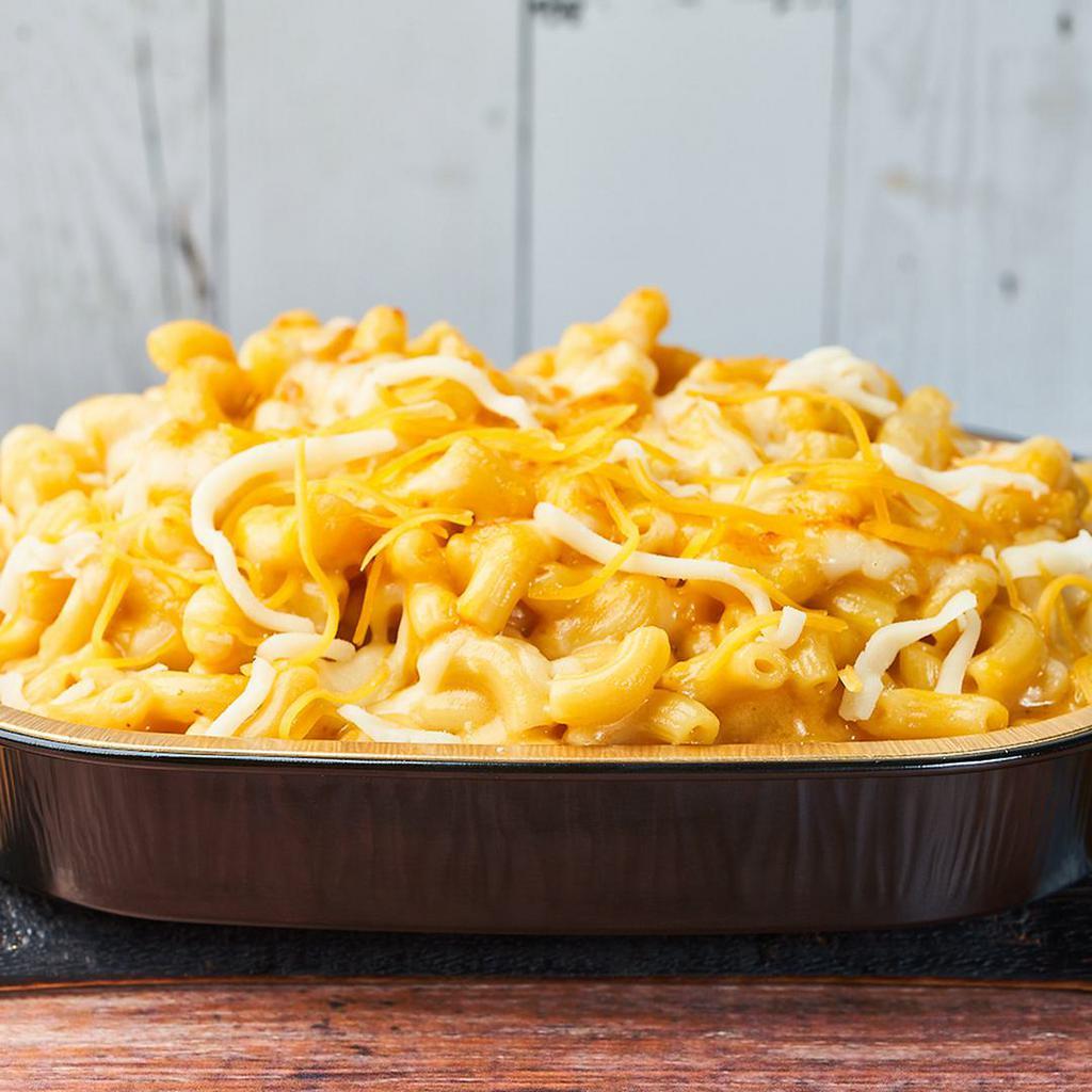 The Classic Mac by Mac 'n Cue · By Mac 'n Cue by International Smoke. Our blend of cheddar and American cheese tossed with elbow mac. Vegetarian. Contains gluten, dairy, and soy. We cannot make substitutions.