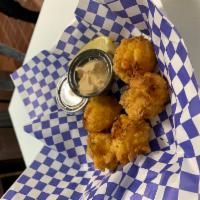 Lobster and Mac Cheese Bites · Made in house, fried with a side of garlic aioli. 