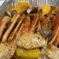 Snow Crab Legs · Served with jumbo shrimp, clams, corn and potatoes.