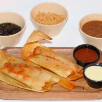 Tamales · Two tamales, rice and beans with choice of black beans or charro beans.
