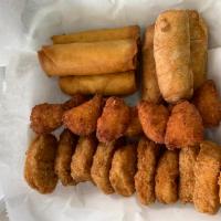 UBF Appetizers Mix (Small) · 5 Chicken Nuggets
5 Mac and Cheese Bites 
5 Party Egg Rolls (Spring Rolls)
5 Tostones 
5 Coc...