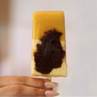 Passion Fruit with Mousse and Brownies  Ice Pop · This amazing frozen treat has layers of in house passion fruit mousse, passion fruit sorbet ...
