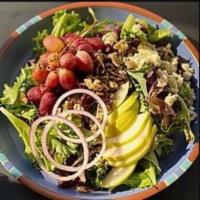 Farmhouse Salad · Mixed greens with pears, blue cheese, pumpkin seeds, roasted grapes, candied pecans, red oni...