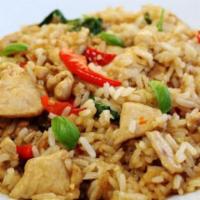 Basil Fried Rice · Stir-fried rice with chicken, 2pc shrimp, eggs, onion, pineapple, basil, and chili paste.
