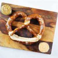 Oven-Baked Soft Pretzel · House made cheese sauce, whole grain mustard