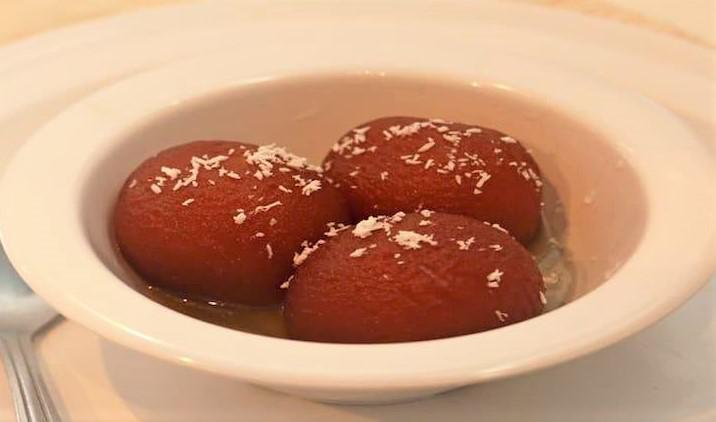 Gulab Jamun · 2 fried little balls of joy. Soaked in a sweet honey syrup.