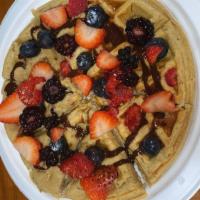 Fit Waffles · Warm and Golden waffles with all the nutrients you need to satisfy your body and cravings! 2...