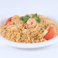 32. Thai Fried Rice · Thai fried rice with choice of protein, eggs, tomatoes, onions, green onions.