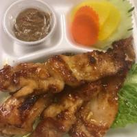 Chicken Satay · Chicken barbecued on skewer, served with homemade peanut sauce.
4 skewer