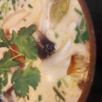 Tom Kha Kai · Chicken with coconut milk, galangal, cilantro, lime juice, mushroom and kaffir leaves.
Come ...