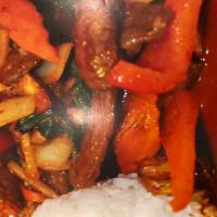 Nuea Pad Pug · Pepper steak. Beef sliced fish sauce, cornstarch sliced onions, bell pepper sesame oil and f...