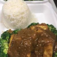 Pataya Chicken · Sauteed chicken with homemade peanut sauce, served with steamed vegetables.