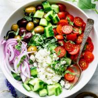Classic Greek Salad · Fresh Greens, cucumber, tomato, red onions, black olive, and feta cheese.