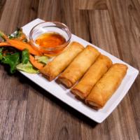 Crispy Thai Rolls · Wrapped with mixed vegetables, carrots, cabbage, pumpkin, and clear noodles. Served with Tha...