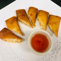 Crab Rangoon · Mixed crab meat, cream cheese, wrapped in spring roll skin served with Thai sweet and sour s...