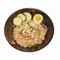 Snow Crab Fried Rice · Fried rice in brown sauce with snow crab meat, crab claw, green onion, tomato and egg.