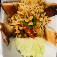 Som Tum Pra Chon · Papaya salad fried fish topped with peanuts