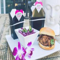 BBQ Pulled Pork Sandwich · Slow-cooked pork infused with south pacific flavors and BBQ sauce and served on a kona bun. ...
