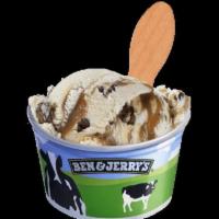 Stephen Colbert's Americone Dream · Vanilla ice cream with fudge covered waffle cone pieces and a caramel swirl.