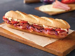 Ham and Cheese Sub · Ham, provolone cheese, tomatoes, red onions and mayo.