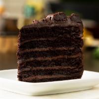 Triple Chocolate Cake · Colossal Chocolate cake, with layer upon layer of dark, moist chocolate sandwiched with silk...