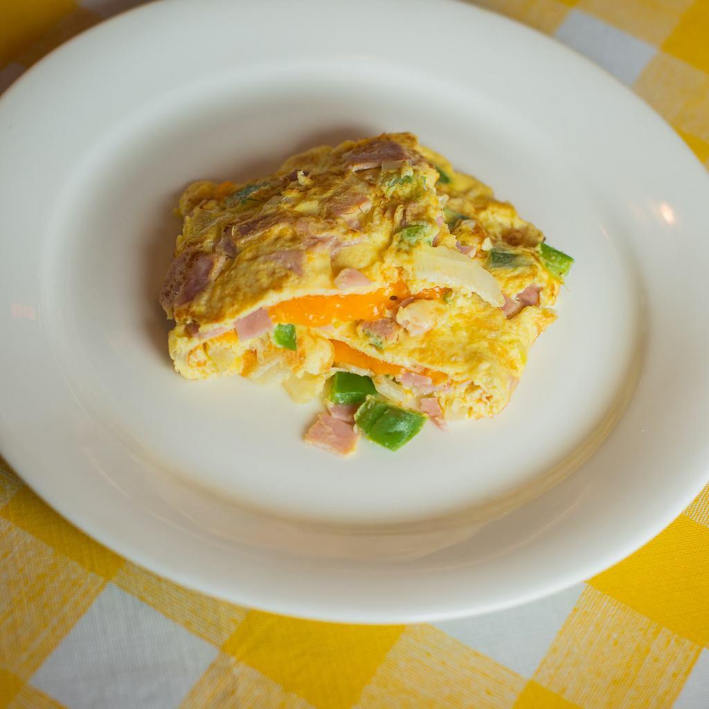 Western Omelet · 3 eggs, Ham, Peppers, Onions and cheddar cheese.
