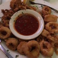 Calamari · Sauteed with spinach and garlic or fried or grilled.