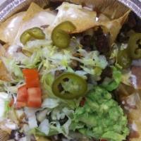 Nachos Fajitas · Tortillas chips, beans, cheese, sour cream, jalapeno, lettuce, tomatoes pepper, and onions. ...