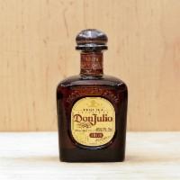 Don Julio Añejo · Light amber color with grapefruit and mandarin aromatics and hints of honey and butterscotch...