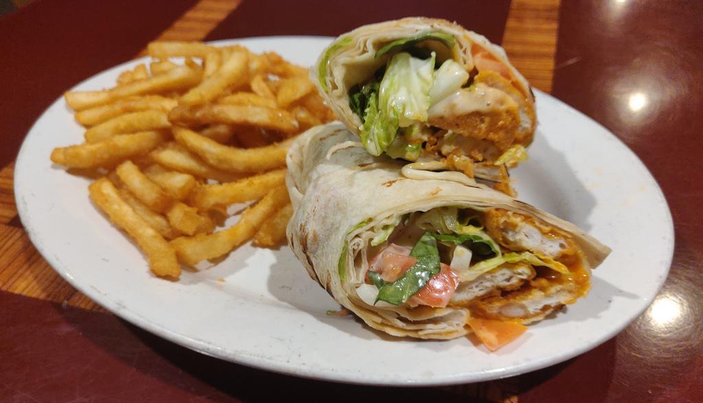 Buffalo Chicken Wrap · Buffalo sauce, lettuce, tomato, and guacamole. Served with fries and a side of ranch