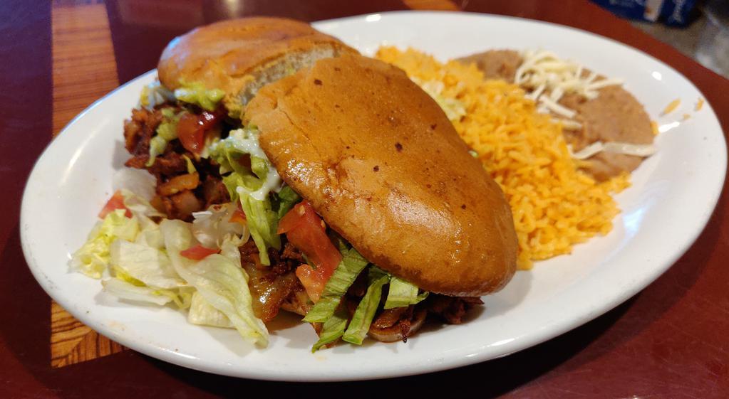 Torta Dinner · Served with rice, beans, salad and tortillas.